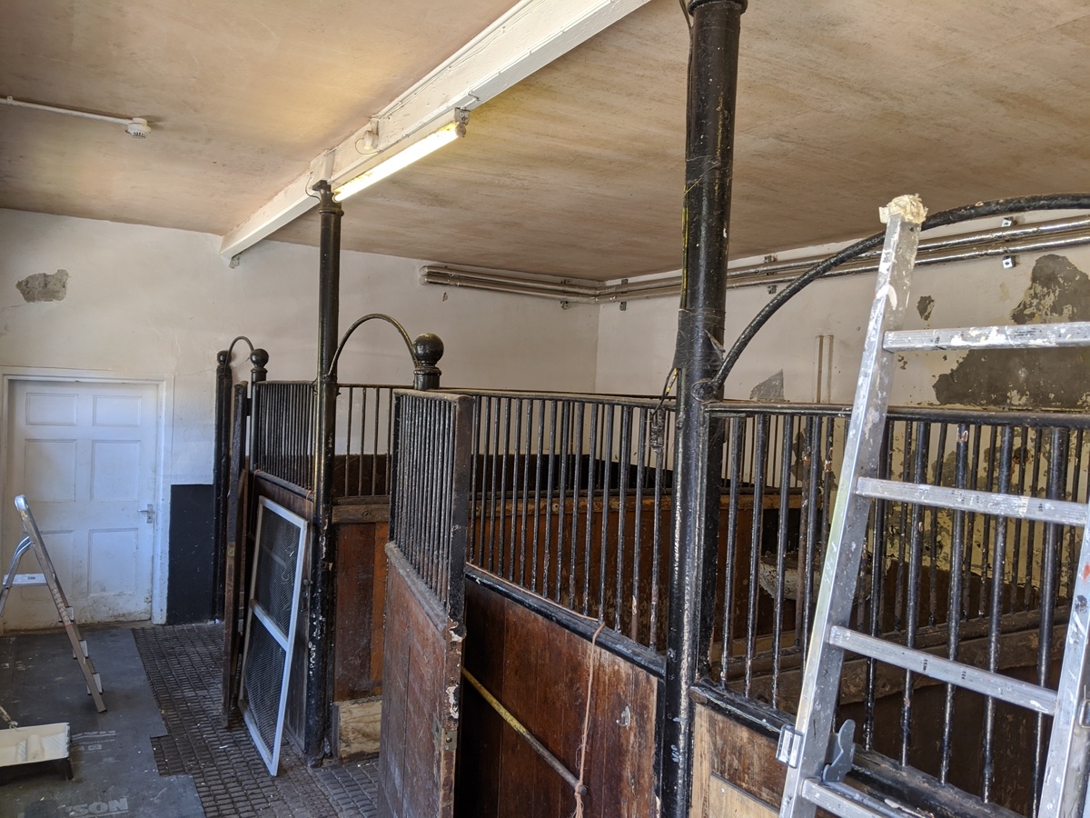 Stables exterior before renovation and repainting
